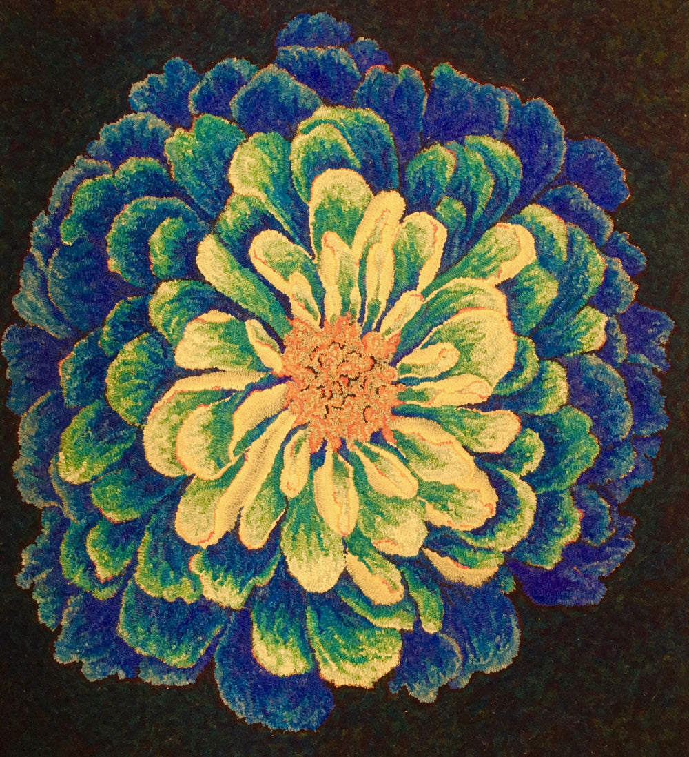 Zany Zinnia wool hooked rug in blue, green, and yellow