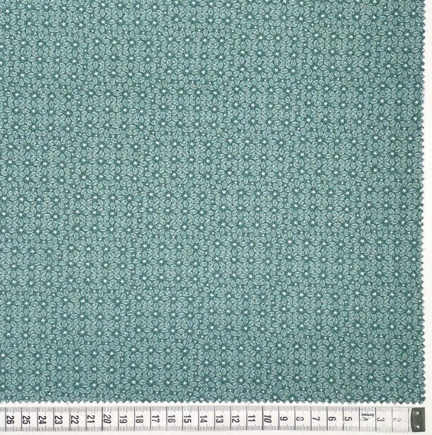 Botanicals 80990-123 - turquoise cotton fabric with very light white daisies scattered over